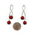 Twist Red Sphere Earrings-Earrings-Reinhard Gremli-Pistachios